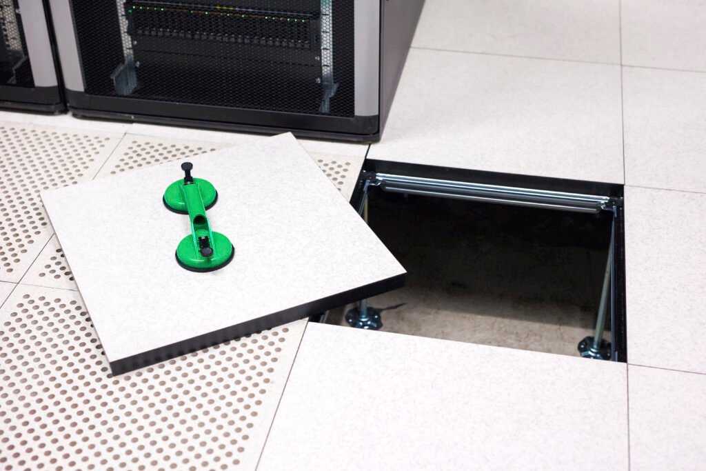 Data center floor with a lifted tile